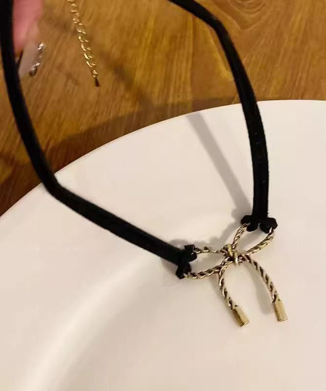 Chic Black Make Old Black Gold Bow Pendant Necklace