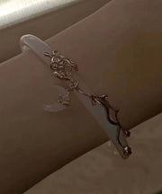 Elegant White Alloy Coloured Glaze Moon Bangle