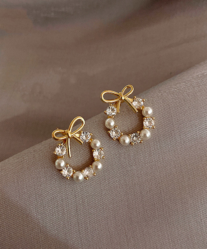 Fashion Gold Copper Alloy Pearl Bow Stud Earrings