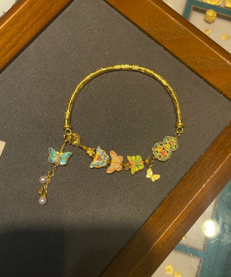Fine Gold Ancient Gold Pearl Enamel Butterfly Tassel Bangle