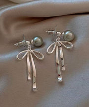 Fine Grey Copper Alloy Pearl Bow Drop Earrings