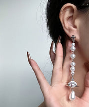 Original Silk Sterling Silver Pearl Asymmetric Saturn Drop Earrings