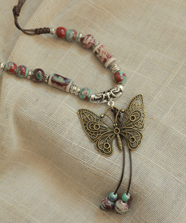 Retro Alloy Ceramic Beads Butterfly Small Bell Tassel Lariat Necklace