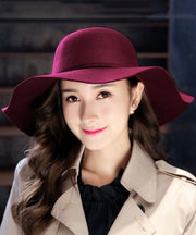 Stylish Mulberry Wave Brim Bow Woolen Cloche Hat