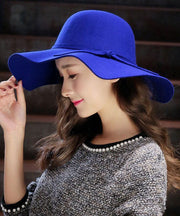 Stylish Mulberry Wave Brim Bow Woolen Cloche Hat