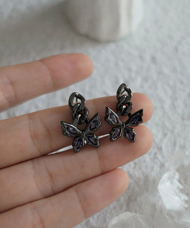 Unique Black Stainless Steel Zircon Bow Hollow Out Stud Earrings