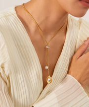 Unique Gold Stainless Steel Asymmetric Pearl Tassel Pendant Necklace