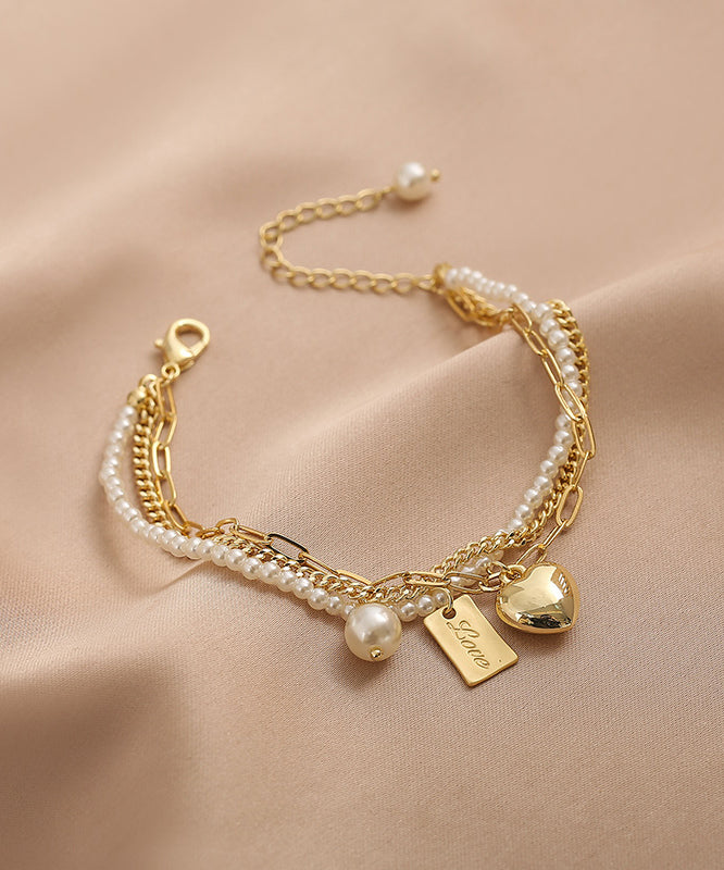 Vogue Gold Metal Alloy Pearl Graphic Love Tassel Charm Bracelet