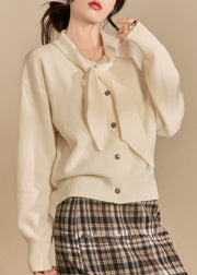 Women Beige Bow Button Solid Knit Sweaters Winter