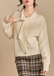 Women Beige Bow Button Solid Knit Sweaters Winter