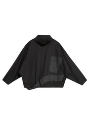Art Schwarzer Rollkragen-Patchwork-Taschen-Pullover mit Fledermausärmeln