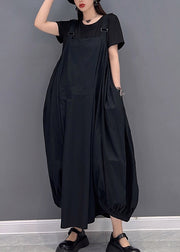 Schöne schwarze O-Neck asymmetrische Taschen lange Kleider ärmellos