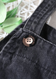 Schöne schwarze Taschen Knopf Herbst Loch Denim Outfits Strampler