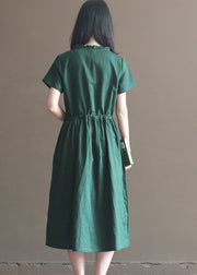 Schönes schwarzgrünes, gekräuseltes, faltiges Baumwollkleid mit kurzen Ärmeln