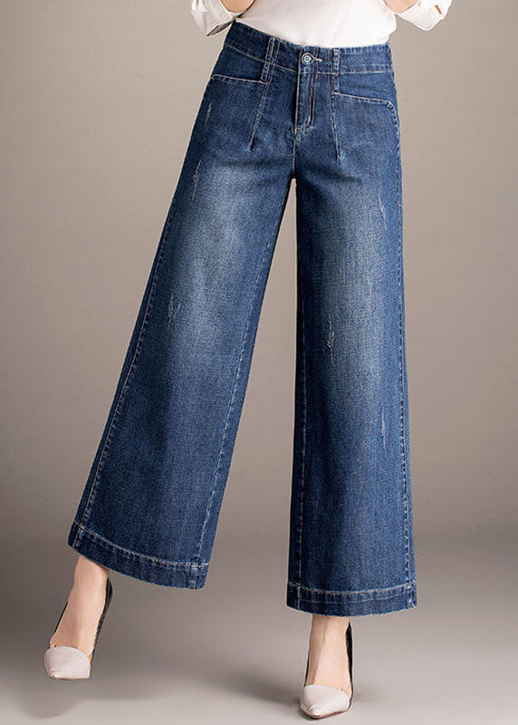 Schöne Jeansblaue Taschen mit hoher Taille, die gerade Hosen aus Baumwolle drapieren
