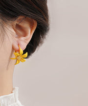 Beautiful Yellow Asymmetricar Lily Floral Stud Earrings