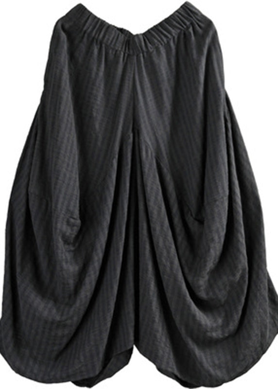 Schwarzer asymmetrischer Hosenrock mit elastischen Taillentaschen Sommer
