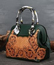 Boutique Handtasche aus Kalbsleder im Patchwork-Stil mit schwärzlich-grünem Print