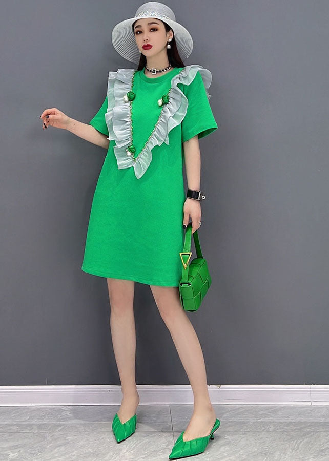 Boutique Grünes Patchwork-Rüschenkleid aus Baumwolle mit O-Ausschnitt und kurzen Ärmeln