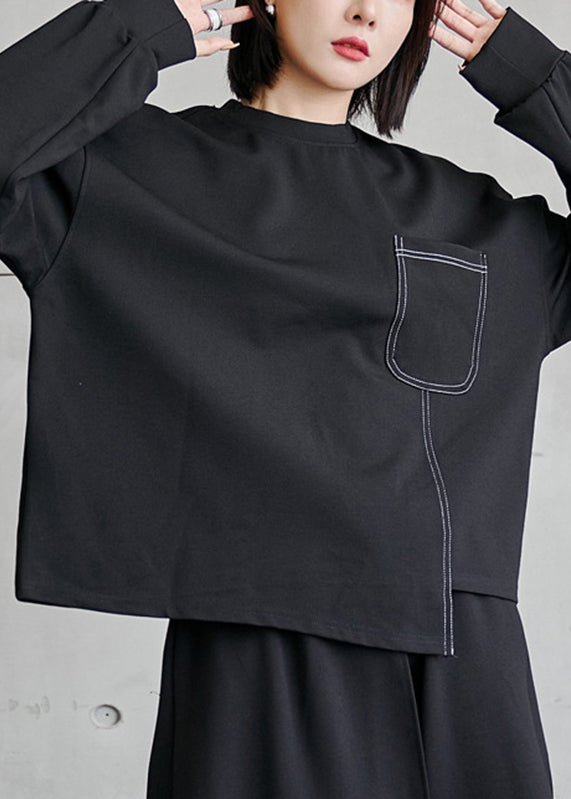 Lässiger schwarzer O-Ausschnitt, asymmetrische Taschen, Patchwork-Oberteil mit langen Ärmeln
