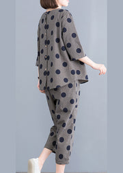 Lässige schwarze O-Neck-Knopf-Karo-Punkt-Baumwolloberseite, elastische Taillenhose, zweiteiliges Set mit halben Ärmeln