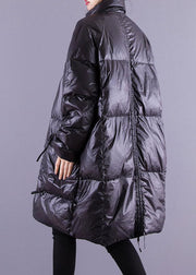 Lässiger schwarzer Mantel mit Reißverschlusstaschen aus feiner Baumwolle im Winter