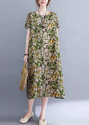 Lässiges grünes O-Neck Print Taschen langes Kleid mit kurzen Ärmeln