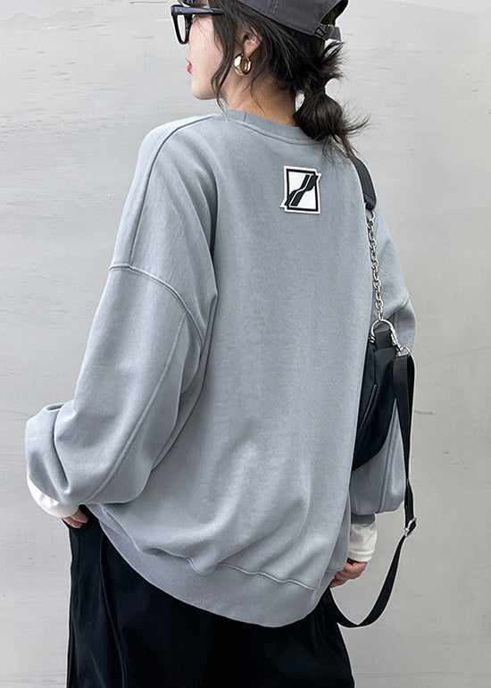 Lässiger grauer Pullover mit O-Ausschnitt und Charakterdruck Streetwear Langarm