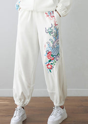 Lässige, weiße, bestickte Blumen-Hosen mit hoher Taille und Hosenträgern im Herbst