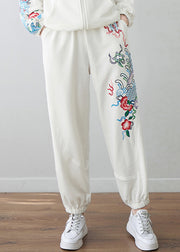 Lässige, weiße, bestickte Blumen-Hosen mit hoher Taille und Hosenträgern im Herbst