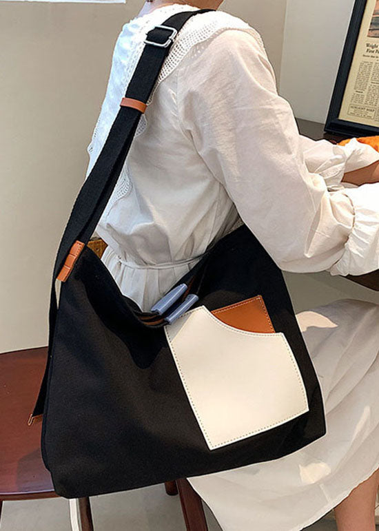 Schicke, schwarze, solide Canvas-Taschenhandtasche