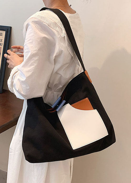 Schicke, schwarze, solide Canvas-Taschenhandtasche