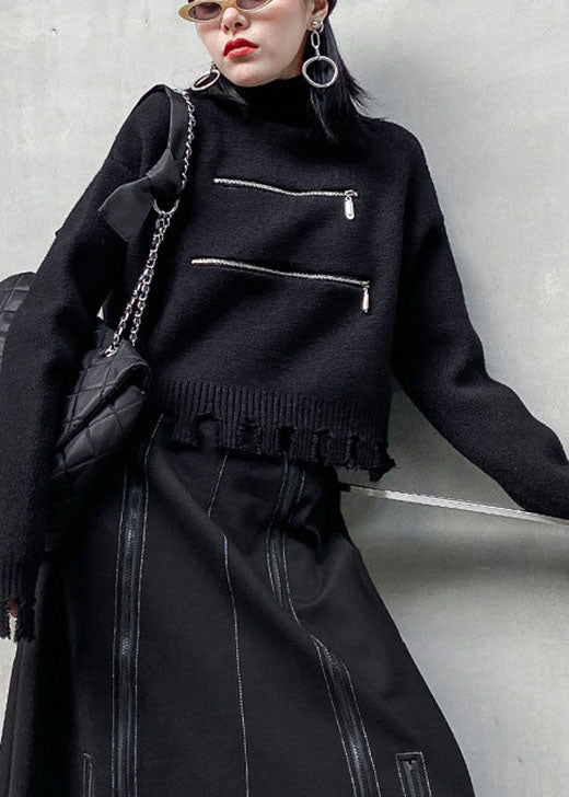 Schicker schwarzer Mode-Herbstpullover mit Reißverschluss und Troddeln