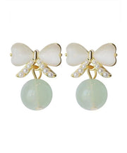 Chic White Allloy Inlaid Pearl Cat's Eye Bow Drop Earrings
