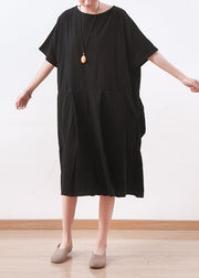 Schicke schwarze Leinenkleidung Korea Nähendes asymmetrisches Baggy-Sommerkleid mit O-Ausschnitt