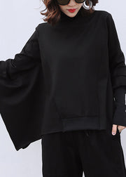 Klassischer schwarzer Rollkragenpullover mit asymmetrischem Patchwork-Baumwollpullover mit langen Ärmeln