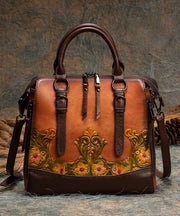 Elegante braune Handtasche aus Kalbsleder mit Sonnenblumen-Prägung
