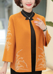 Elegante orange O-Neck bestickte Nagelperlen-Wolljacke mit langen Ärmeln