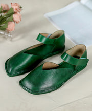 Bequeme grüne flache Schuhe aus Rindsleder mit Schnallenriemen