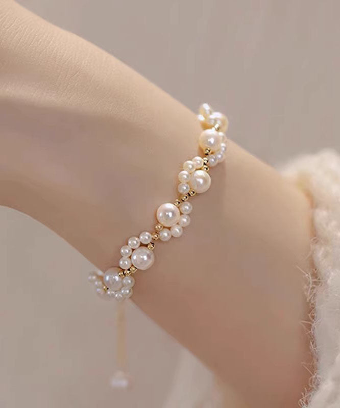 Cute White 14K Gold Pearl Charm Bracelet