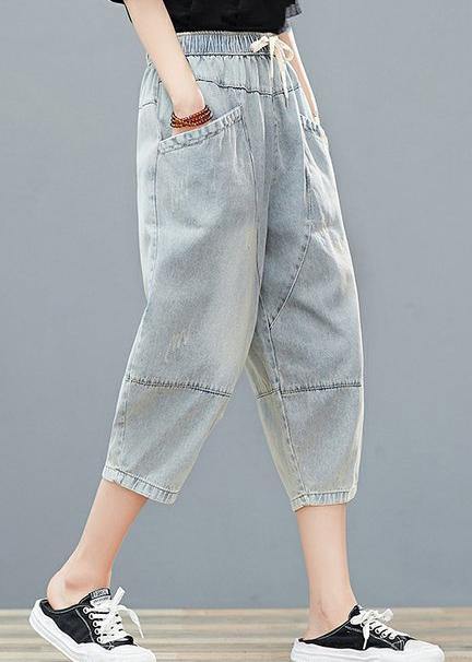 Drawstring personality pocket washed jeans plus size women&