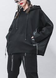 Eleganter schwarzer Taschen-Patchwork-Pullover mit Kordelzug und Fledermausärmeln