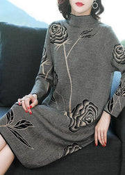 Elegantes schwarzes Strickpullover-Kleid mit Stehkragen und Print Winter