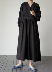 Elegante schwarze V-Ausschnitt Taschen Baumwollkleider mit langen Ärmeln