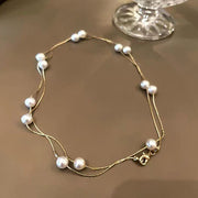 Elegant Gold Alloy Double Layered Pearl Necklace