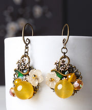 Elegante gelbe Blumen-Kupfer-Tropfen-Ohrringe