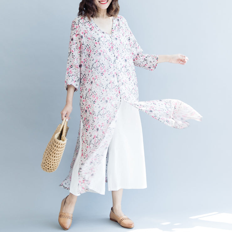 Elegantes rosa bedrucktes langes Baumwollmischkleid Trendy Plus Size V-Ausschnitt Seitlich offenes Kleid Boutique Kleid mit drei Vierteln Ärmeln