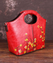 Handtasche aus Kalbsleder mit feinen roten Blumenmustern