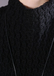Taillierter schwarzer asymmetrischer Strickpullover Frühling