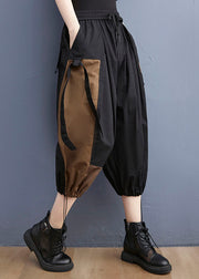 Taillierte, schwarze, asymmetrische Patchwork-Baumwoll-Frühlingshose